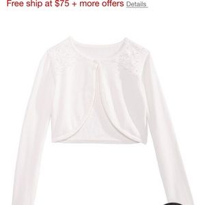 A girls sized sweater to go over a dress